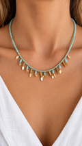 Collier perles turquoise à pampilles dorées