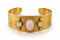 Gold Bangle Bracelets with Pink Stones and Refined Details