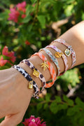 Bracelets Liberty GINGKO – ruban fleuri et breloque dorée